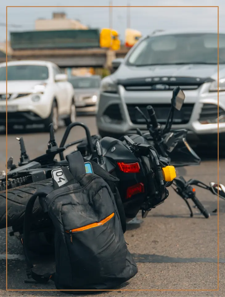A motorcyle hit by a car; rider needs to contact attorney for max compensation.